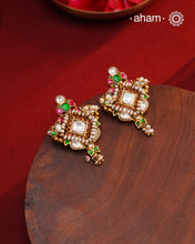 Fine Kundan Earrings with delicate work. Crafted in finest 92.5 silver with gold polish and pearls, these are heirloom earrings that can be passed on for generations to come.