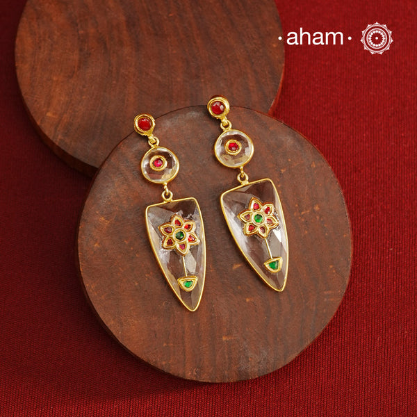 Gold Polish Silver Earrings feature exquisite kundan inlay work, blending traditional craftsmanship with contemporary style. Perfectly suited for Indo-Western ensembles, they add a touch of elegance and sophistication to your look. Crafted with attention to detail making them a versatile accessory for special occasions.