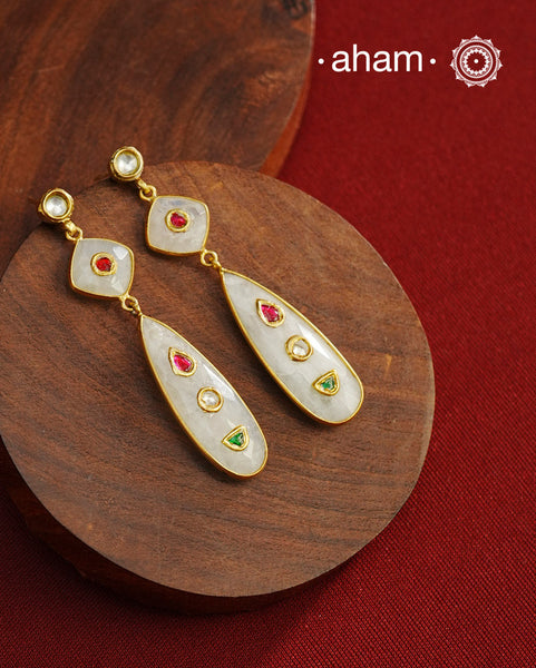Gold Polish Silver Earrings feature exquisite kundan inlay work, blending traditional craftsmanship with contemporary style. Perfectly suited for Indo-Western ensembles, they add a touch of elegance and sophistication to your look. Crafted with attention to detail these make a versatile accessory for special occasions.