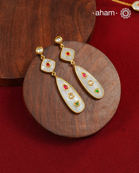Gold Polish Silver Earrings feature exquisite kundan inlay work, blending traditional craftsmanship with contemporary style. Perfectly suited for Indo-Western ensembles, they add a touch of elegance and sophistication to your look. Crafted with attention to detail these make a versatile accessory for special occasions.