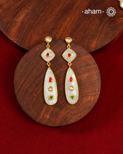 Gold Polish Silver Earrings feature exquisite kundan inlay work, blending traditional craftsmanship with contemporary style. Perfectly suited for Indo-Western ensembles, they add a touch of elegance and sophistication to your look. Crafted with attention to detail these make a versatile accessory for special occasions.
