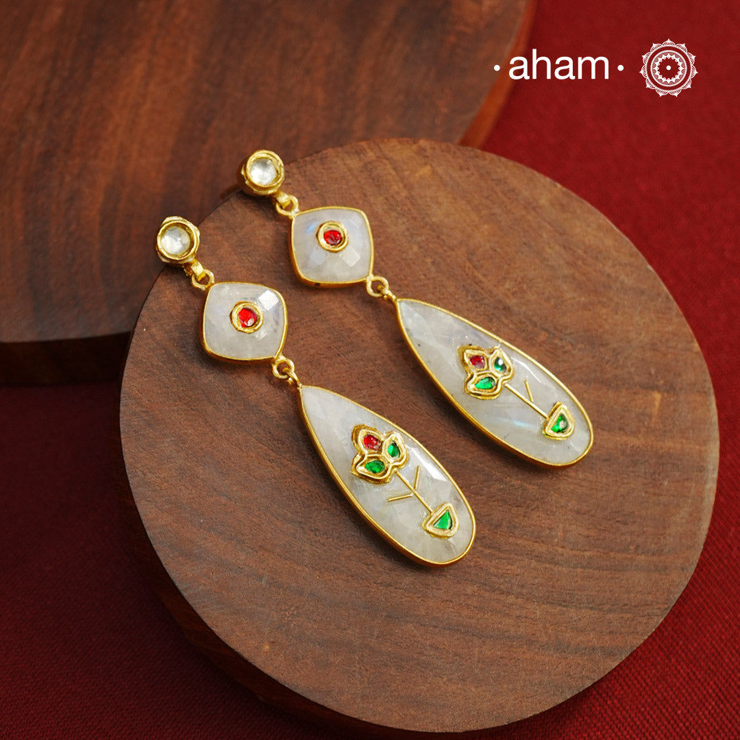 Gold Polish Silver Earrings feature exquisite kundan inlay work, blending traditional craftsmanship with contemporary style. Perfectly suited for Indo-Western ensembles, they add a touch of elegance and sophistication to your look. Crafted with attention to detail these make a versatile accessory for special occasions.