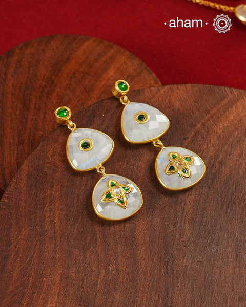 Gold Polish Silver Earrings feature exquisite kundan inlay work, blending traditional craftsmanship with contemporary style. Perfectly suited for Indo-Western ensembles, they add a touch of elegance and sophistication to your look. Crafted with attention to detail these make a versatile accessory for special occasions.