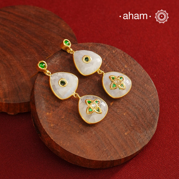 Gold Polish Silver Earrings feature exquisite kundan inlay work, blending traditional craftsmanship with contemporary style. Perfectly suited for Indo-Western ensembles, they add a touch of elegance and sophistication to your look. Crafted with attention to detail these make a versatile accessory for special occasions.