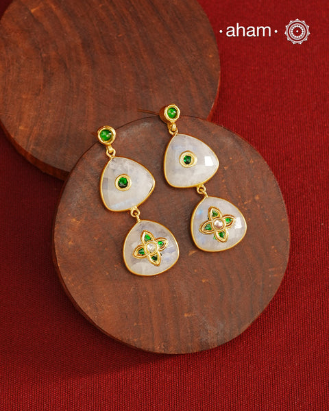 Gold Polish Silver Earrings feature exquisite kundan inlay work, blending traditional craftsmanship with contemporary style. Perfectly suited for Indo-Western ensembles, they add a touch of elegance and sophistication to your look. Crafted with attention to detail these make a versatile accessory for special occasions.