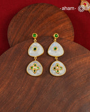 Gold Polish Silver Earrings feature exquisite kundan inlay work, blending traditional craftsmanship with contemporary style. Perfectly suited for Indo-Western ensembles, they add a touch of elegance and sophistication to your look. Crafted with attention to detail these make a versatile accessory for special occasions.