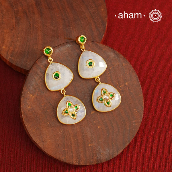 Gold Polish Silver Earrings feature exquisite kundan inlay work, blending traditional craftsmanship with contemporary style. Perfectly suited for Indo-Western ensembles, they add a touch of elegance and sophistication to your look. Crafted with attention to detail these make a versatile accessory for special occasions.