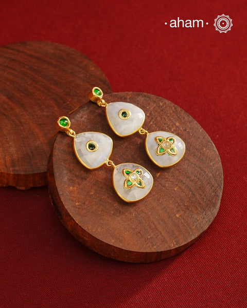 Gold Polish Silver Earrings feature exquisite kundan inlay work, blending traditional craftsmanship with contemporary style. Perfectly suited for Indo-Western ensembles, they add a touch of elegance and sophistication to your look. Crafted with attention to detail these make a versatile accessory for special occasions.