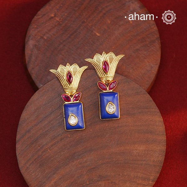 Gold Polish Silver Earrings. The earrings are handcrafted in 92.5 sterling silver with gold polish. Style this up with your favourite ethnic or fusion outfits to complete the look.