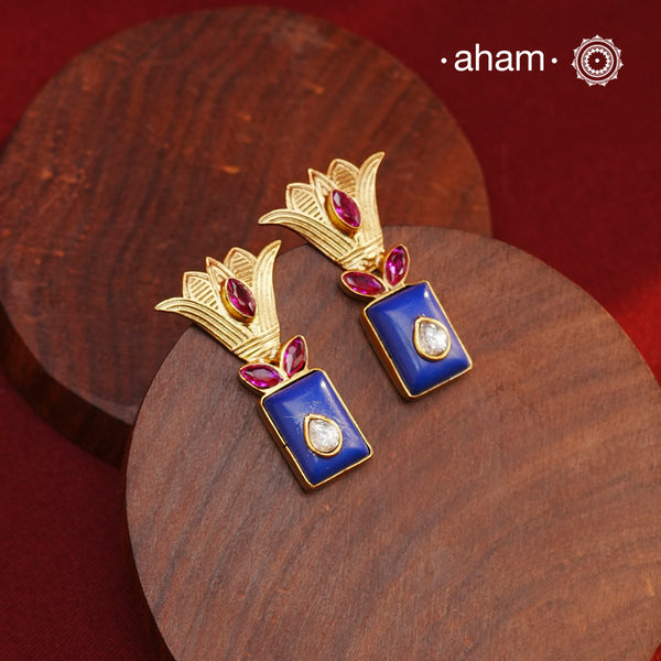 Gold Polish Silver Earrings. The earrings are handcrafted in 92.5 sterling silver with gold polish. Style this up with your favourite ethnic or fusion outfits to complete the look.
