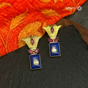 Gold Polish Silver Earrings. The earrings are handcrafted in 92.5 sterling silver with gold polish.Style this up with your favourite ethnic or fusion outfits to complete the look.