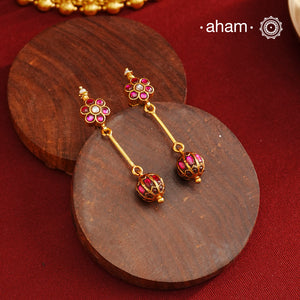 These Gold Polish Silver Earrings beautifully reflect the elegance of South Indian traditional design, featuring delicate kemp work. Crafted from 92.5% pure silver with a fine gold polish, it is a graceful and timeless design that complements your style effortlessly.