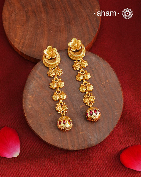 Beautiful half moon kemp drop earrings  Handcrafted using traditional methods in 92.5 sterling silver with gold polish. Pair these with your ethnic outfits this festive season to ace your look.