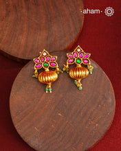 These Gold Polish Peacock Silver Earrings beautifully reflect the elegance of South Indian traditional design, featuring delicate kemp work. Crafted from 92.5% pure silver with a fine gold polish, it is a graceful and timeless design that complements your style effortlessly.