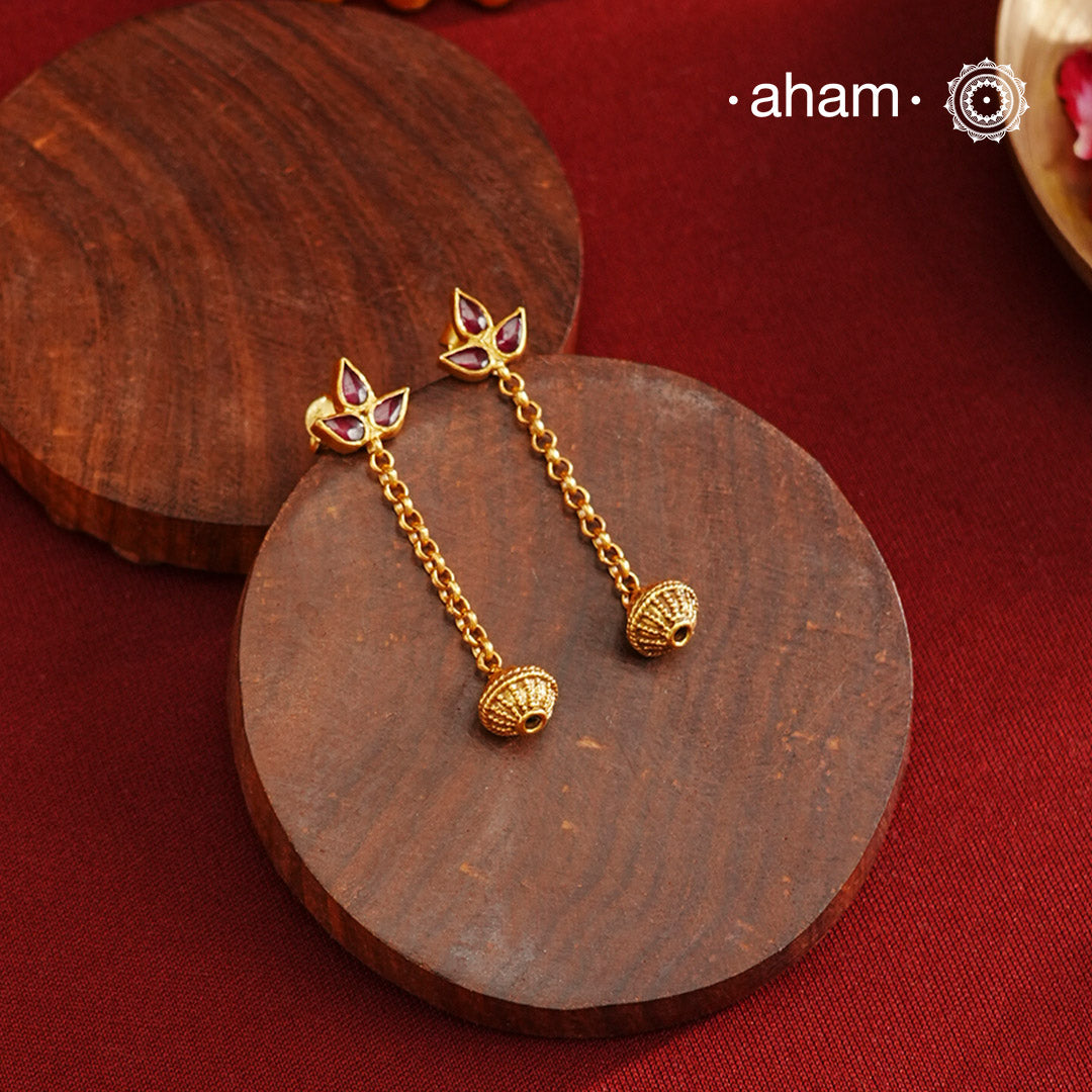 Light weight earrings crafted in 92.5 silver with gold polish and kemp highlight.