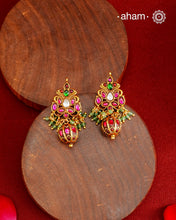 Gold polish silver earrings showcasing intricate kemp work, meticulously handcrafted in 92.5 sterling silver using traditional methods. The rich gold finish enhances their timeless appeal, making them an ideal accessory to elevate ethnic outfits during festive occasions with elegance and authenticity.