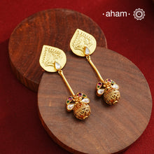 Beautiful drop silver earrings handcrafted using traditional methods in 92.5 sterling silver with gold polish and kundan work. Pair these with your ethnic outfits this festive season to ace your look.