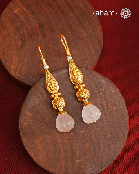 Light weight silver earrings with gold polish with Lakshmiji and a green drop. 
Handcrafted using traditional methods in 92.5 sterling silver with gold polish. 
Pair these with your ethnic outfits this festive season to ace your look.