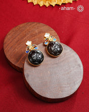 Statement gold polish earring with beautiful carved black onyx and kundan peacocks on the top. 
Handcrafted using traditional methods in 92.5 sterling silver with gold polish. 
Pair these with your ethnic outfits this festive season to ace your look.