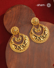 These Gold Polish Silver Chandbali Earrings showcase intricate rava and filigree craftsmanship, reflecting timeless traditional design. Crafted from 92.5% sterling silver with a delicate gold polish, they offer enduring elegance suitable for generations. Their classic style ensures they remain a fashionable choice for any occasion.
