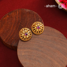 Traditional Gold Polish Studs with a kemp Center.Handcrafted using traditional methods in 92.5 sterling silver with gold polish.Perfect to Pair these with your ethnic outfits this festive season.