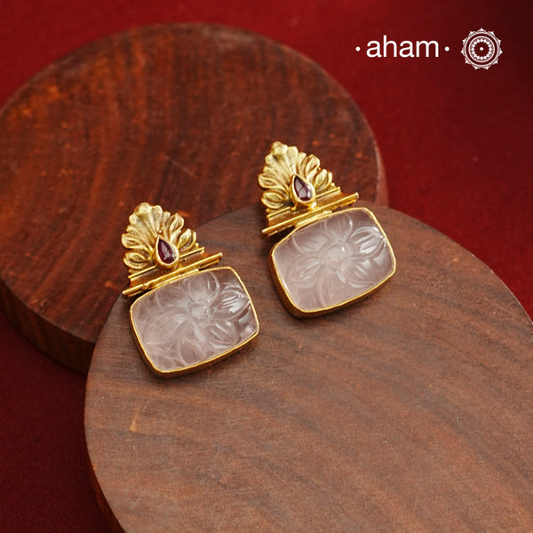 These Gold Polish Silver Earrings feature a contemporary design highlighed by carved rose quartz. Expertly crafted in 92.5% sterling silver and finished with a refined gold polish, they offer a sophisticated blend of modern style and timeless elegance. Ideal for adding a distinctive touch to both casual and formal ensembles.