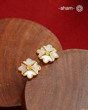 Embrace the allure of timeless elegance with Aham Jewellery’s latest Mother of Pearl collection, a radiant choice for festive celebrations and weddings. Each piece is crafted in 92.5 silver and adorned with a luxurious gold polish, capturing the iridescent beauty of mother of pearl.

This collection is designed with festivities, bridesmaids, and destination weddings in mind, offering a versatile blend of tradition and contemporary charm. Ideal for those seeking an ethereal statement, our Mother of Pearl col