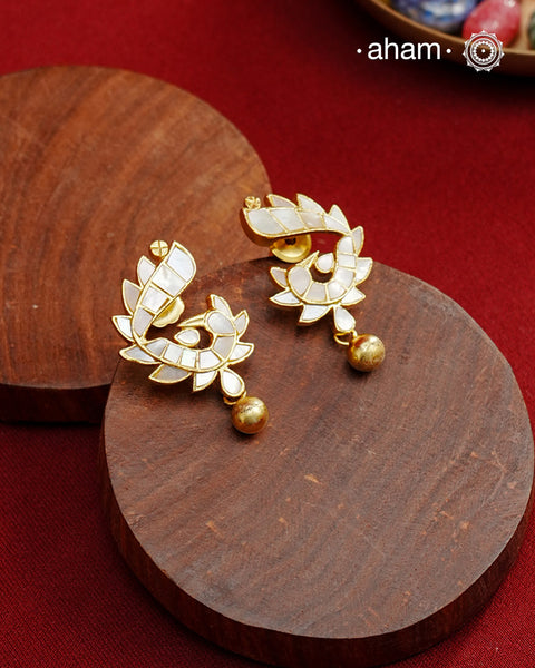 Embrace the allure of timeless elegance with Aham Jewellery’s latest Mother of Pearl collection, a radiant choice for festive celebrations and weddings. Each piece is crafted in 92.5 silver and adorned with a luxurious gold polish, capturing the iridescent beauty of mother of pearl.

This collection is designed with festivities, bridesmaids, and destination weddings in mind, offering a versatile blend of tradition and contemporary charm. Ideal for those seeking an ethereal statement, our Mother of Pearl col