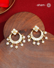 Embrace the allure of timeless elegance with Aham Jewellery’s latest Mother of Pearl collection, a radiant choice for festive celebrations and weddings. Each piece is crafted in 92.5 silver and adorned with a luxurious gold polish, capturing the iridescent beauty of mother of pearl.

This collection is designed with festivities, bridesmaids, and destination weddings in mind, offering a versatile blend of tradition and contemporary charm. Ideal for those seeking an ethereal statement, our Mother of Pearl col