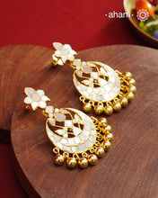 Embrace the allure of timeless elegance with Aham Jewellery’s latest Mother of Pearl collection, a radiant choice for festive celebrations and weddings. Each piece is crafted in 92.5 silver and adorned with a luxurious gold polish, capturing the iridescent beauty of mother of pearl.

This collection is designed with festivities, bridesmaids, and destination weddings in mind, offering a versatile blend of tradition and contemporary charm. Ideal for those seeking an ethereal statement, our Mother of Pearl col