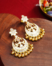 Embrace the allure of timeless elegance with Aham Jewellery’s latest Mother of Pearl collection, a radiant choice for festive celebrations and weddings. Each piece is crafted in 92.5 silver and adorned with a luxurious gold polish, capturing the iridescent beauty of mother of pearl.

This collection is designed with festivities, bridesmaids, and destination weddings in mind, offering a versatile blend of tradition and contemporary charm. Ideal for those seeking an ethereal statement, our Mother of Pearl col