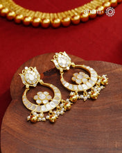 Embrace the allure of timeless elegance with Aham Jewellery’s latest Mother of Pearl collection, a radiant choice for festive celebrations and weddings. Each piece is crafted in 92.5 silver and adorned with a luxurious gold polish, capturing the iridescent beauty of mother of pearl.

This collection is designed with festivities, bridesmaids, and destination weddings in mind, offering a versatile blend of tradition and contemporary charm. Ideal for those seeking an ethereal statement, our Mother of Pearl col