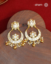 Embrace the allure of timeless elegance with Aham Jewellery’s latest Mother of Pearl collection, a radiant choice for festive celebrations and weddings. Each piece is crafted in 92.5 silver and adorned with a luxurious gold polish, capturing the iridescent beauty of mother of pearl.

This collection is designed with festivities, bridesmaids, and destination weddings in mind, offering a versatile blend of tradition and contemporary charm. Ideal for those seeking an ethereal statement, our Mother of Pearl col