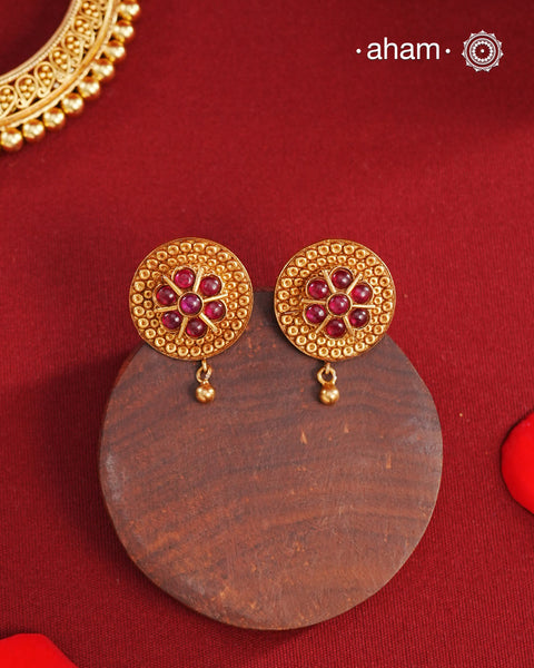 Statement gold polish earring with beautiful designs inspired from the temples of South India. Handcrafted using traditional methods in 92.5 sterling silver with dull gold polish.
Pair these with your ethnic outfits this festive season to ace your look.