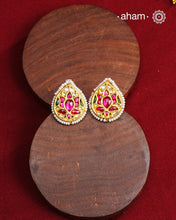 Festive gold polish studs with vibrant floral kundan work. Handcrafted in 92.5 sterling silver using jadau kundan techniques. Perfect for special occasions, pair these floral earrings with your favourite ethnic outfits.