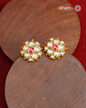 Traditional Gold Polish Studs with a Kemp Center and Kundan work.
Handcrafted using traditional methods in 92.5 sterling silver with gold polish.&nbsp;
Perfect to Pair these with your ethnic outfits this festive season.&nbsp;