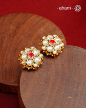 Traditional Gold Polish Studs with a Kemp Center and Kundan work.
Handcrafted using traditional methods in 92.5 sterling silver with gold polish.&nbsp;
Perfect to Pair these with your ethnic outfits this festive season.