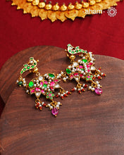 Fine Kundan Earrings with delicate work. Crafted in finest 92.5 silver with gold polish and pearls, these are heirloom earrings that can be passed on for generations to come.&nbsp;
