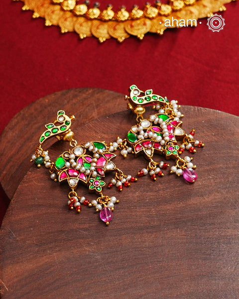 Fine Kundan Earrings with delicate work. Crafted in finest 92.5 silver with gold polish and pearls, these are heirloom earrings that can be passed on for generations to come.&nbsp;
