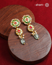 Traditional Gold Polish earrings with kundan and pearl work.&nbsp;
Handcrafted using traditional methods in 92.5 sterling silver with gold polish.&nbsp;
Perfect to Pair these with your ethnic outfits this festive season.&nbsp;