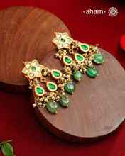 Fine Kundan Earrings with delicate handwork. Crafted in finest 92.5 silver with gold polish and pearls, these are heirloom earrings that can be passed on for generations to come.