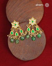 Fine Kundan Earrings with delicate handwork. Crafted in finest 92.5 silver with gold polish and pearls, these are heirloom earrings that can be passed on for generations to come.