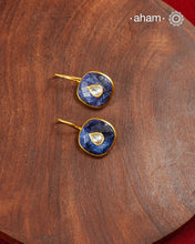 Gold Polish Silver Earrings feature exquisite kundan inlay work, blending traditional craftsmanship with contemporary style. Perfectly suited for Indo-Western ensembles, they add a touch of elegance and sophistication to your look. Crafted with attention to detail making them a versatile accessory for special occasions.