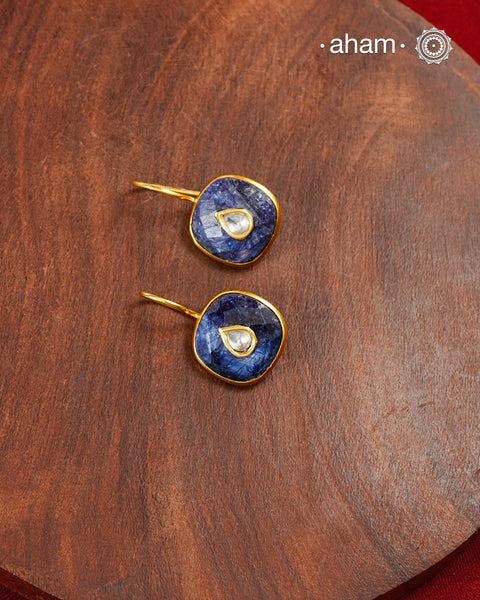 Gold Polish Silver Earrings feature exquisite kundan inlay work, blending traditional craftsmanship with contemporary style. Perfectly suited for Indo-Western ensembles, they add a touch of elegance and sophistication to your look. Crafted with attention to detail making them a versatile accessory for special occasions.