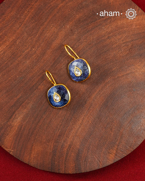 Gold Polish Silver Earrings feature exquisite kundan inlay work, blending traditional craftsmanship with contemporary style. Perfectly suited for Indo-Western ensembles, they add a touch of elegance and sophistication to your look. Crafted with attention to detail making them a versatile accessory for special occasions.