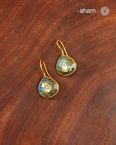 Gold Polish Silver Earrings feature exquisite kundan inlay work, blending traditional craftsmanship with contemporary style. Perfectly suited for Indo-Western ensembles, they add a touch of elegance and sophistication to your look. Crafted with attention to detail making them a versatile accessory for every occassion.