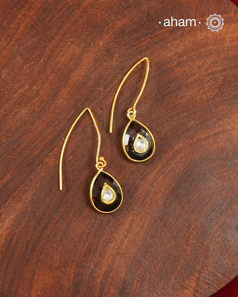 Gold Polish Silver Earrings feature exquisite kundan inlay work, blending traditional craftsmanship with contemporary style. Perfectly suited for Indo-Western ensembles, they add a touch of elegance and sophistication to your look. Crafted with attention to detail making them a versatile accessory for special occasions.