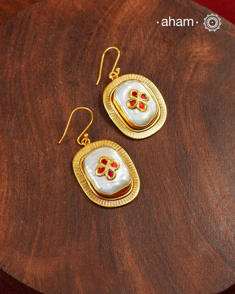 Gold Polish Silver Earrings feature exquisite kundan inlay work, blending traditional craftsmanship with contemporary style. Perfectly suited for Indo-Western ensembles, they add a touch of elegance and sophistication to your look. Crafted with attention to detail making them a versatile accessory for special occasions.