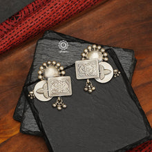 One of a kind rising sun and flower earrings. Wearable art pieces crafted in 92.5 sterling silver.