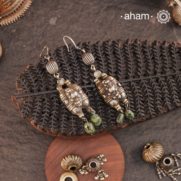 A beautiful pair of earrings made with some vintage pieces and emerald drops.